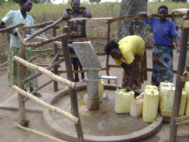 Akello Susan Fetching her water