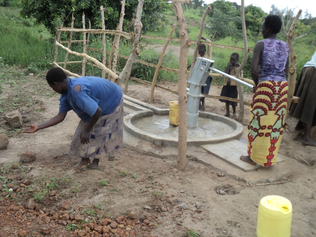 Eunice Ameny 22 years cleaning their new water point